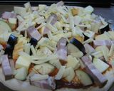 A picture of step 5 of Delicious Eggplant, Bacon & Cheese Pizza.