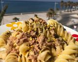 Foto del passaggio 7 della ricetta Fusilloni tonno e granella di pistacchi