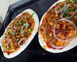 A picture of step 2 of chicken tikka pizza.