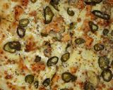 A picture of step 3 of Chicken tikka pizza.