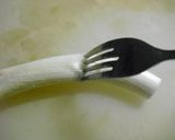 A picture of step 2 of Easily Chop Green Onions Using a Fork.