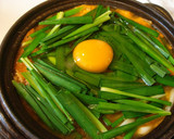 A picture of step 3 of Kimchi Jjigae Stewed Udon.