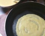 A picture of step 9 of Pancake Mix Strawberry Crepes.