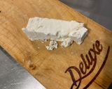 Une image de l'étape 4 de Salade composée de melon à la mortadelle, feta, mozzarella tressée, origan et crème de balsamique.