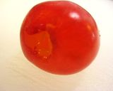 A picture of step 4 of How to Pit Cherries.