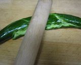 A picture of step 1 of Pounded and Rubbed Cucumbers.