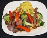 A picture of step 4 of Lomo Saltado with Broccoli and Red Bell Pepper.