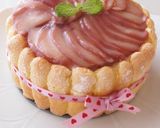 A picture of step 29 of Peach Bavarois Charlotte Cake.