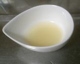 A picture of step 4 of Creamy Melting Triple-layered Mango Pudding.