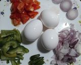 A picture of step 1 of Egg Bhurji.