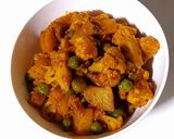 A picture of step 7 of Cauliflower Peas Potato Sabzi.