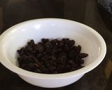 A picture of step 1 of Ice Cream Malaga (Vanilla, Dry Raisins And Rum).