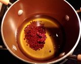 A picture of step 3 of Achiote oil or annato seed oil.