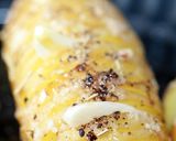 A picture of step 7 of Sig's Humbles ( hasselback potatoes).