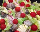 A picture of step 4 of Easy Wine-Steamed Clams & Cabbage.