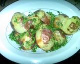 A picture of step 6 of Garlicky parsley red potatoes.