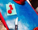 A picture of step 8 of Kitchen Themed Cake.