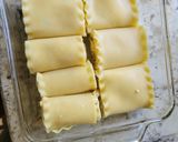 A picture of step 7 of Bourbon barbecue chicken lasagna roll ups.