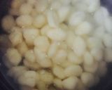 A picture of step 1 of Seafood Gnocchi With White Wine Parmesan Sauce.