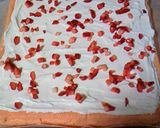 A picture of step 13 of Strawberry Tiramisu Roll Cake.