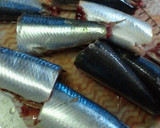 A picture of step 1 of Simmered Sardines and Umeboshi.