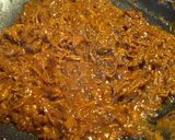 A picture of step 1 of Egg Roll wrapped barbecued shredded Chicken.