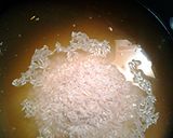 A picture of step 1 of Kaffir Lime leaves in rice with chicken.
