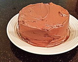 A picture of step 12 of Chocolate Crunch Layer Cake.