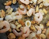 A picture of step 3 of My Garlic Seared Scallops and Fish medley. 😘.