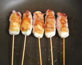 A picture of step 5 of Crispy Skewered Pork Wraps with Edamame and Cheese.