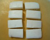 A picture of step 1 of Hanpen Fish Cake and Cheese Wrapped with Shiso Leaves and Bacon.
