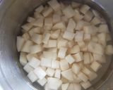 A picture of step 1 of Potato Pumpkin curry.