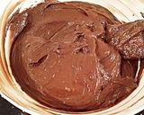 A picture of step 6 of Chocolate Individual Cheesecakes with a Salted Chocolate Caramel Glaze.