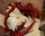 A picture of step 2 of Creamy Spicy Bean Dip.