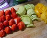 A picture of step 8 of Strawberry, Kiwi, and Peach Mille Crêpes Cake.