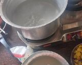 A picture of step 3 of Smokey tandoori chicken drumsticks biryani with mint mango raita.