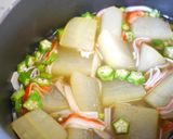A picture of step 5 of Simmered Winter Melon, Imitation Crab and Okra.