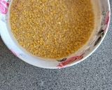 A picture of step 2 of Weat and moong dal dalia.