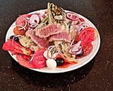 A picture of step 4 of Grilled Romaine Antipasto Salad.