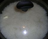 A picture of step 2 of How to Make Rice in a Frying Pan.
