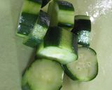 A picture of step 2 of Easy and Colorful Yellow Cucumber and Onion Pickles.