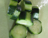 A picture of step 2 of Easy and Colorful Yellow Cucumber and Onion Pickles.