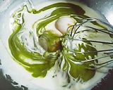 A picture of step 2 of Great As A Gift Matcha Marbled Unbaked Cheesecake.