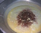 A picture of step 17 of Dodha Burfi with Daliya.