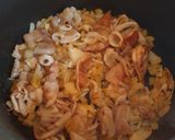 Foto del paso 4 de la receta Guiso de patatas con calamar, alcachofas y habitas tiernas