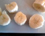 A picture of step 2 of red velvet and chocolate covered fried banana balls.