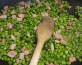 A picture of step 2 of Mini sausage skewers with pancetta and peas.