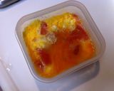 A picture of step 4 of Microwaved Scrambled Eggs with Tomato.