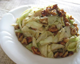 A picture of step 6 of Stir Fried Cabbage and Walnuts with Lemon Butter.