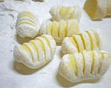 A picture of step 6 of Sweet Potato Gnocchi with Garlic and Butter Sauce.